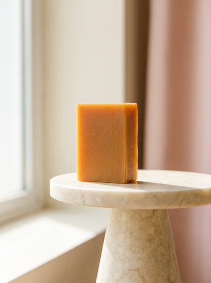 Clarifying Back & Body Bar on a marble pedestal